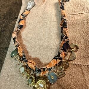 Brand new. Never worn. Bandana Bohemian Charm Necklace with Gold Accents